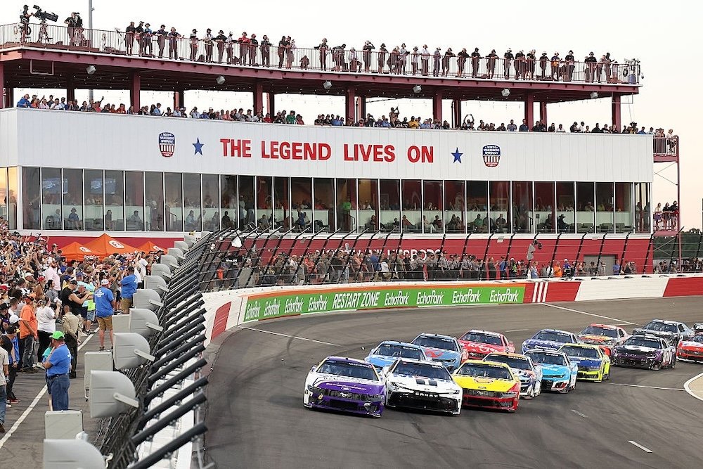 NORTH WILKESBORO, NORTH CAROLINA - MAY 18: Brad Keselowski, driver of the #6 Solomon Plumbing Ford, Christopher Bell, driver of the #20 Mobil 1 Toyota, and Joey Logano, driver of the #22 Shell Pennzoil Ford, race during the NASCAR Cup Series All-Star Race at North Wilkesboro Speedway on May 18, 2025 in North Wilkesboro, North Carolina. (Photo by David Jensen/Getty Images)