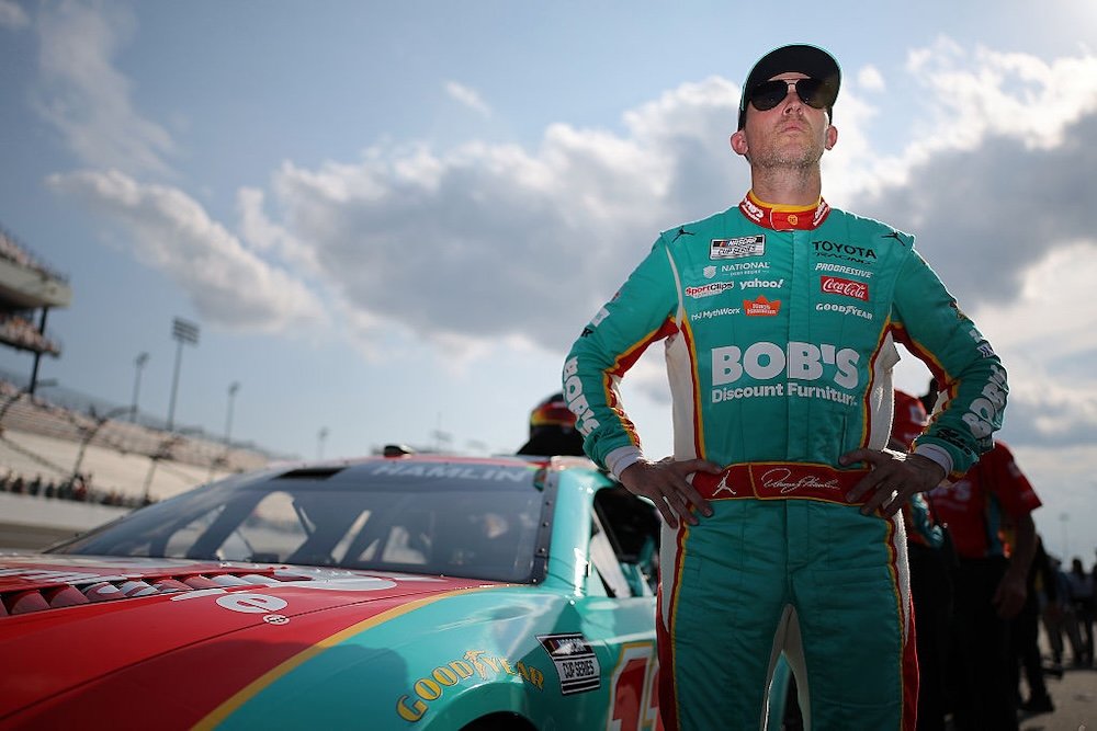RICHMOND, VIRGINIA - AUGUST 14: Denny Hamlin, driver of the #11 Bob's Discount Furniture Toyota, looks on during qualifying for the NASCAR Cup Series Cook Out 400 at Richmond Raceway on August 14, 2026 in Richmond, Virginia. (Photo by Jonathan Bachman/Getty Images)